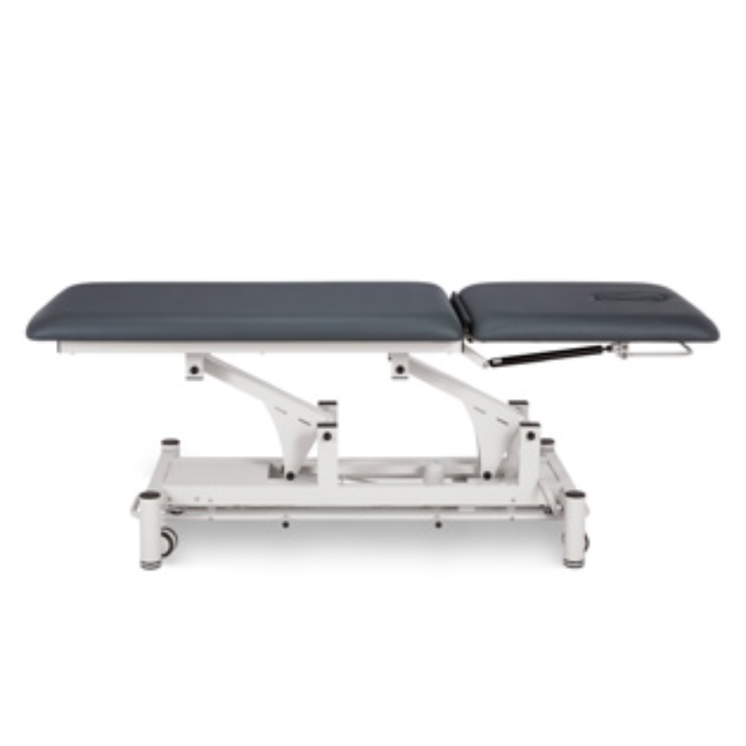 Camilla eléctrica para fisioterapia Plus con barra perimetral, 195 x 66 cm. Tapizado gris y base color blanco Camilla eléctrica para fisioterapia Plus con barra perimetral, 195 x 66 cm. Tapizado gris y base color blanco