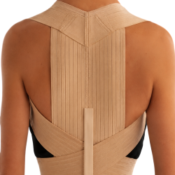 Espaldillera correctora con cierre de velcro graduable, color beige. Varias tallas